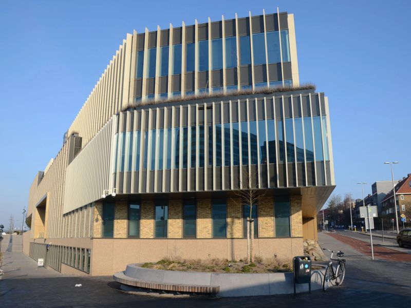 The angular, fin-clad facade of the Cito building seen from the street